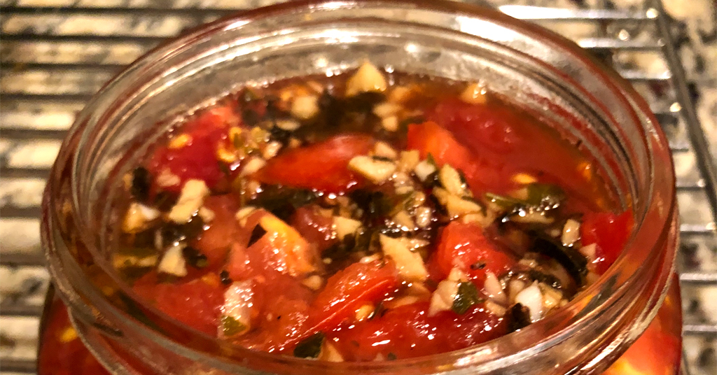 Bruschetta packed into Ball mason jars for waterbath canning.