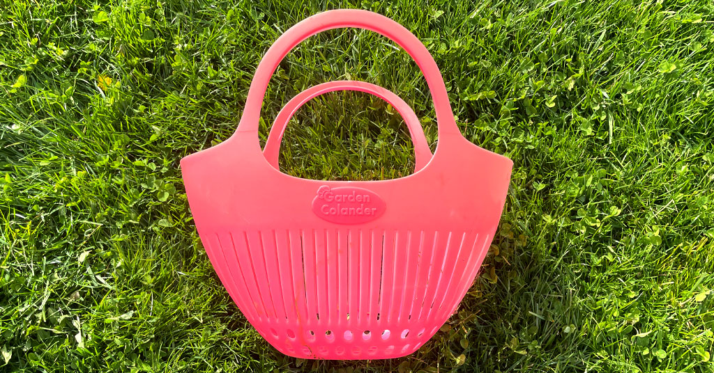 Harvesting baskets make great gardening gifts for mom. This pink harvesting basket helps me carry the harvest from the garden to the kitchen.
