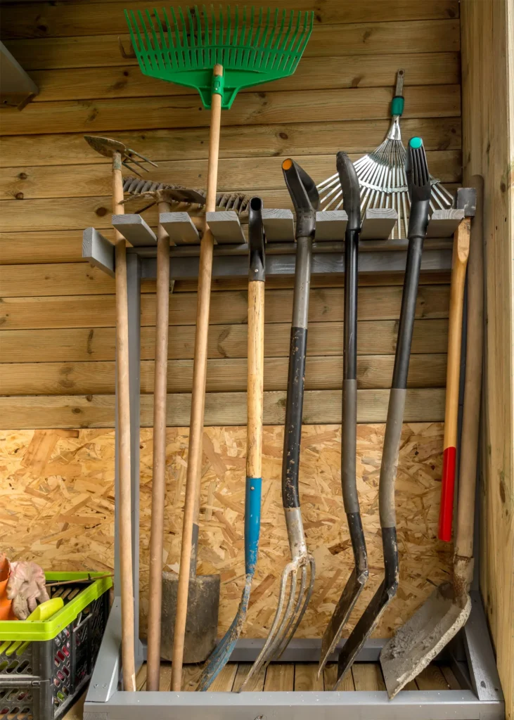 Organized Garden Tools on a rack.